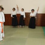 Three students testing sideways exercise.