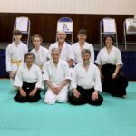 A portrait of Sensei O'Connell with the students of the Lochaber Aikido Club.